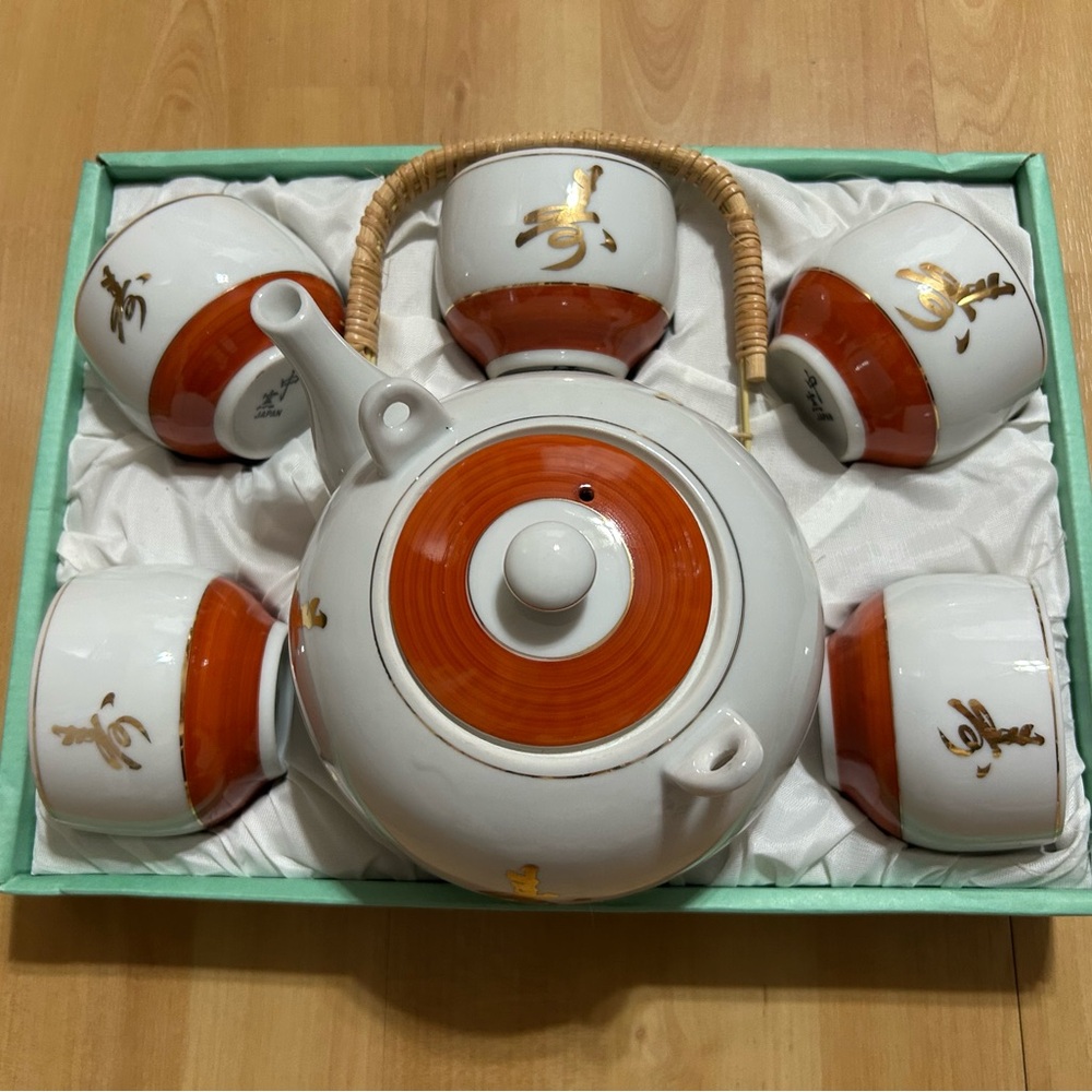 White Ceramic Tea Set with Burnt Orange Accents